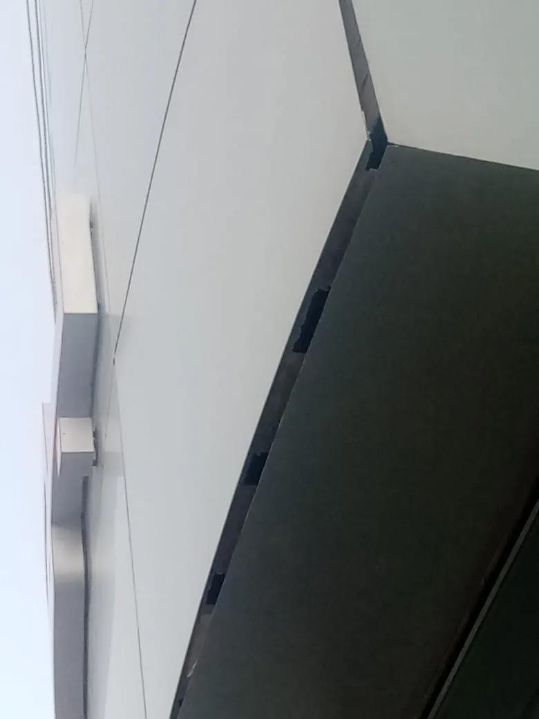 Porsche showroom cladding rectification before